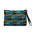 Crossbody bag featuring the abstract Jetfin Reef shark graphic in turquoise, orange and black.
