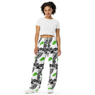 Urban City Wheels Signal wide-leg pants with an abstract black-and-white pattern and flying green skateboards.