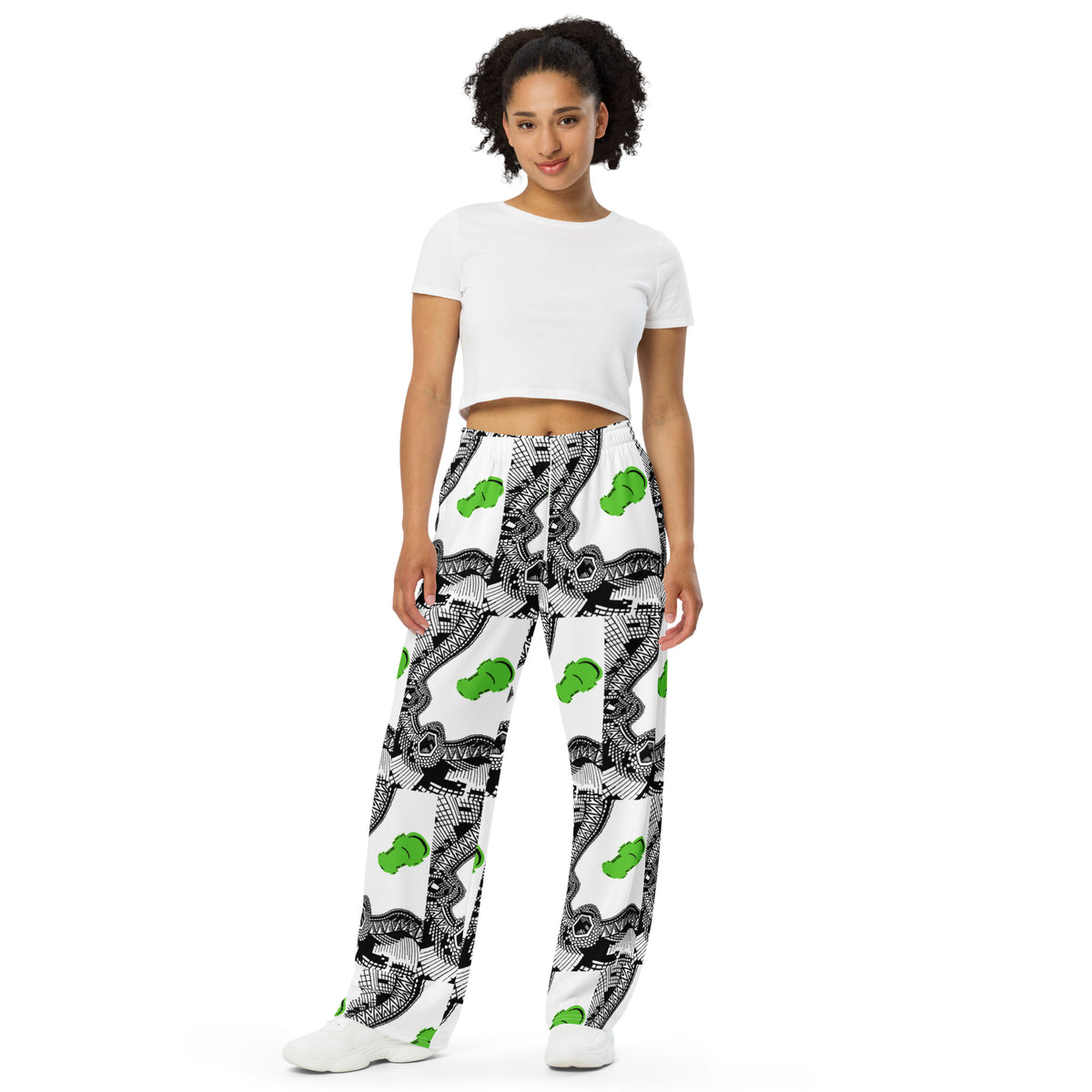 Urban City Wheels Signal wide-leg pants with an abstract black-and-white pattern and flying green skateboards.