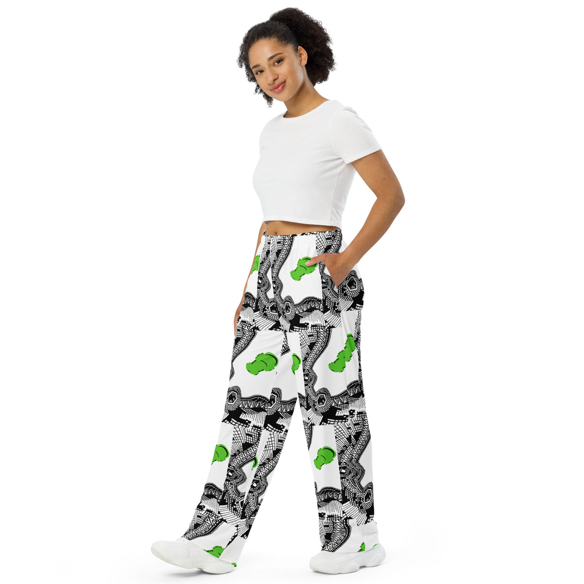 Urban City Wheels Signal wide-leg pants with an abstract black-and-white pattern and flying green skateboards.