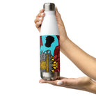 Stainless steel water bottle with an abstract city graphic and a black skateboard flying across a turquoise sky.