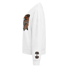 Left side. White crew neck sweatshirt featuring a centered graphic of an illustrated retro fridge and skateboard design in orange, brown, and black tones.