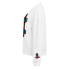 Left side White crew neck sweatshirt featuring a centered technical graphic of a skateboard top-down view in vibrant red, cyan blue, and black accents.
